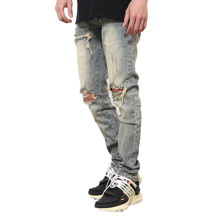 Ripped Washed Elastic Mid-waist Denim Trousers